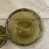 Geel groene glazen pot